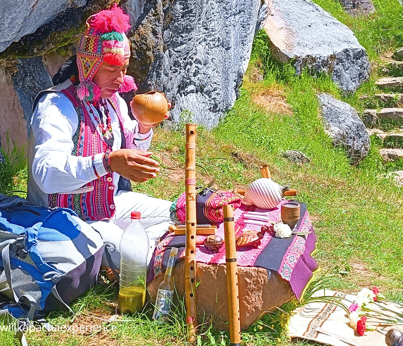 Andean shaman drinking from ritual cup - Ayahuasca retreat Cusco, Peru